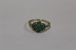 A 9K GOLD DRESS RING SET WITH GREEN STONES SIZE - Q APPROX WEIGHT - 2.3G