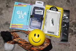 A CAGE OF PHONE CASES ETC (CAGE NOT INCLUDED)