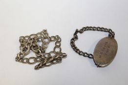 A VINTAGE SILVER BRACELET TOGETHER WITH A NECKLACE