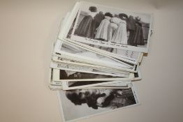 A COLLECTION OF BLACK AND WHITE POSTCARDS