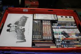 A TRAY OF DVDS (TRAY NOT INCLUDED)