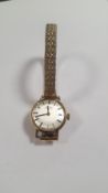 A ROTARY WRIST WATCH POSSIBLY 9 CT