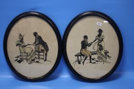 A PAIR OF OVAL FRAMED SILHOUETTES