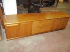 A VINTAGE TEAK LOW SIDEBOARD