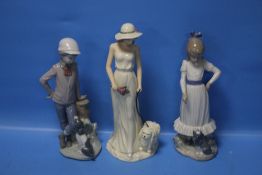 A NAO FIGURE AND FIGURINE TOGETHER WITH A REGAL FIGURINE 'FAITH' (3)