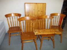 A PINE KITCHEN DINING TABLE AND FOUR CHAIRS