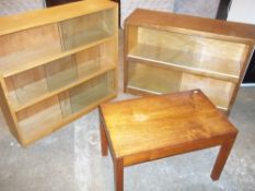 TWO GLAZED BOOK SHELVES AND ONE COFFEE TABLE