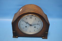 AN OAK 'ANVIL' MANTEL CLOCK