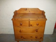 AN ANTIQUE SOLID PINE WASH STAND CHEST