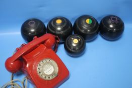 FOUR LAWN BOWLS COMPRISING TWO 'TAYLOR ELITE' AND TWO 'THOMAS TAYLOR NO. 2' AND A JACK TOGETHER WITH