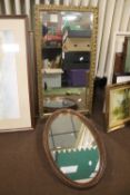 A RECTANGULAR FRAMED MIRROR APPROX. 83 X 45 CM TOGETHER WITH AN OVAL FRAMED MIRROR APPROX. 65 X 40
