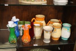 A COLLECTION OF CERAMIC VASES TOGETHER WITH A SMALL COLLECTION OF COLOURED GLASS VASES