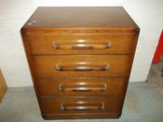 AN ART DECO STYLE FOUR DRAWER CHEST
