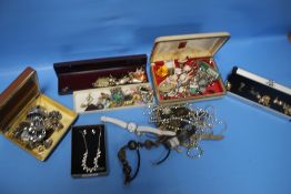 A QUANTITY OF COSTUME JEWELLERY, WRIST WATCHES ETC.