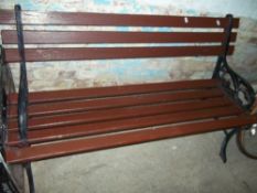 A CAST IRON GARDEN BENCH