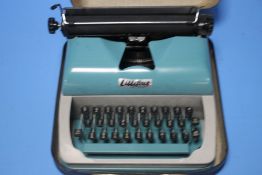 A CASED LILLIPUT TYPEWRITER