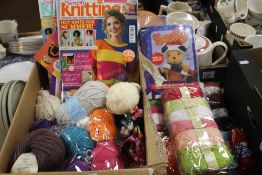A BOX OF WOOL AND MAGAZINES