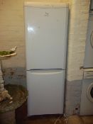 AN INDESIT FRIDGE FREEZER