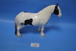 A SIGNED 'JOHN BESWICK' PIEBALD PINTO HORSE