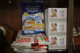 TWENTY EIGHT OREADEX EYE BEAUTY INSTRUMENTS TOGETHER WITH A SMALL COLLECTION OF VACUUM STORAGE BAGS