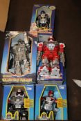 A QUANTITY OF BOXED ROBOTS