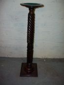 AN ANTIQUE MAHOGANY PLANT DISPLAY STAND