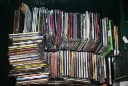 A PLASTIC TUB OF OVER 200 CDS