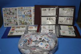 A QUANTITY OF ASSORTED STAMPS TO INCLUDE KILOWARE AND ALBUMS WITH CONTENTS