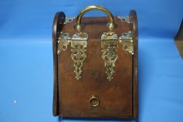 A BRASS BOUND COAL SCUTTLE