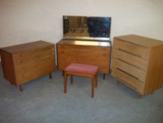 AN ALFRED COX DRESSING TABLE AND A CHEST OF DRAWERS TOGETHER WITH A STAG CHEST OF DRAWERS AND