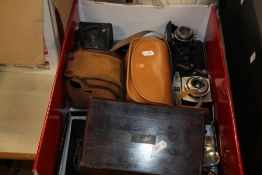 A TRAY OF SUNDRIES CONTAINING THREE VINTAGE CAMERAS, LIGHT METERS, PLATED CUTLERY. VINTAGE PEN /