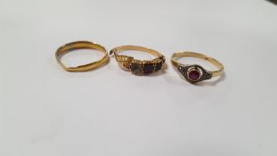 A 22 CT GOLD WEDDING BAND A/F AND TWO YELLOW METAL LADIES RINGS