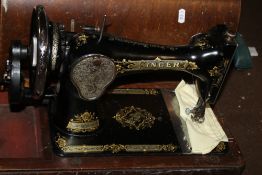 A CASED SINGER SEWING MACHINE