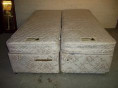 A KINGSIZE ZIP AND LINK BED WHICH SPLITS INTO TWO SMALL EURO SIZE SINGLES I.E. TWO BEDS IN ONE