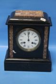 A SLATE MANTEL CLOCK
