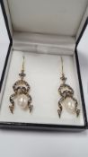 A PAIR OF RIBBON-STYLE DROP EARRINGS SET WITH SUSPENDED PEARLS AND DIAMONDS, BOXED