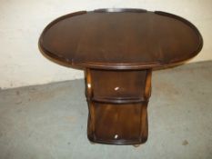 AN ERCOL DROP LEAF SERVING TROLLEY