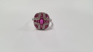 A PLATINUM ART DECO-STYLE PANEL RING SET WITH OVAL-CUT AND CALIBRE-CUT RUBIES AND RBC DIAMONDS,