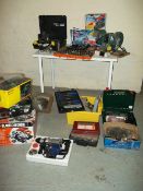 A QUANTITY OF BOXED POWER TOOLS AND A BENCH GRINDER