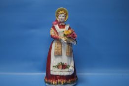 A ROYAL DOULTON FIGURINE 'OLD COUNTRY ROSES'