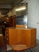 A THREE PIECE BEDROOM SUITE BY GOMME FURNITURE OF HIGH WYCOMBE TO INCLUDE A CORNER DRESSING TABLE, A