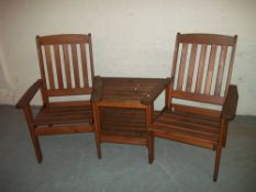 AN ANGLED GARDEN LOVE SEAT