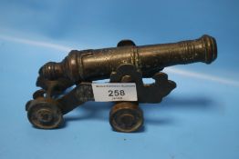 AN ANTIQUE SIGNAL CANNON