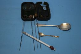 A CASED MORTON OPHTHALMOSCOPE, FOUR HAT PINS, TWO SPOONS ETC.