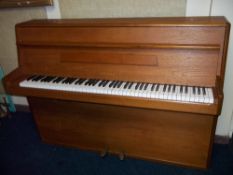 A VINTAGE TEAK WELMAR PIANO