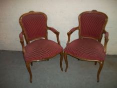 TWO REPRODUCTION OAK CARVED EASY CHAIRS