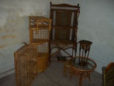 SEVEN WICKER ITEMS INCLUDING A DISPLAY UNIT, CORNER UNIT, BOOKSHELF, TABLES ETC.