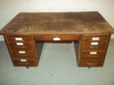 A VINTAGE TWIN PEDESTAL DESK