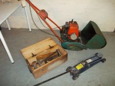 A SUFFOLK COLT PETROL LAWN MOWER, A CAR JACK, A WOODEN LOCKING TOOLBOX AND CONTENTS