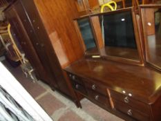 A STAG MINSTREL THREE PIECE BEDROOM SUITE INCLUDING TWO WARDROBES AND A DRESSING TABLE